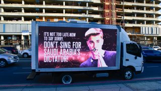 mobile billboards urging Justin Bieber to cancel his upcoming concert in Saudi Arabia
