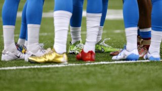 Members of the Carolina Panthers wear cleats to supports NFL's My Cause, My Cleats campaign before a game against the New Orleans Saints at the Mercedes-Benz Superdome on December 3, 2017 in New Orleans, Louisiana.