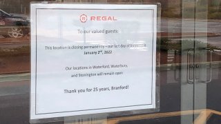 Sign about Regal Theatre in Branford closing