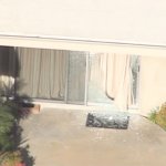 A sliding glass door was shattered in a home invasion and shooting at a Beverly Hills home.