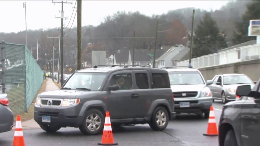 Cars Line Up to Get COVID-19 Test Kits in Waterbury