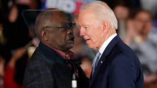 Then-Democratic presidential candidate Joe Biden talks to Rep. James Clyburn, D-S.C.