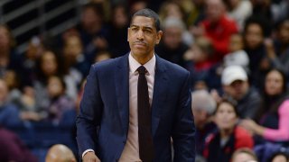 In this Feb. 25, 2018, file photo, Connecticut coach Kevin Ollie watches during the first half the team's NCAA college basketball game in Storrs, Conn.