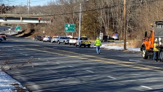 Police at scene of a crash on Route 8 in Shelton