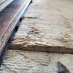 The Hawleys said that their subfloor was not leveled before flooring was laid, leading to complications.