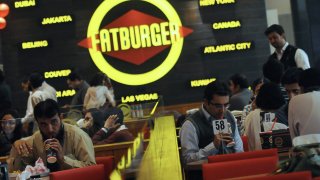 Pakistani customers eat at a Fatburger outlet in Karachi, Pakistan.