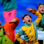 Children dance as part of the pre-show during the opening ceremony of the 2022 Winter Olympics, Feb. 4, 2022, in Beijing.