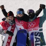 From left, silver medalist United States's Julia Marino, gold medalist New Zealand's Zoi Sadowski Synnott and bronze medalist Australia's Tess Coady celebrate after the women's slopestyle finals at the 2022 Winter Olympics, Feb. 6, 2022, in Zhangjiakou, China.