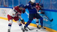 United States' Jesse Compher battles Czech Republic's Lenka Serdar