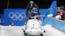 Team USA's Kaillie Humphries and Kaysha Love compete in 2-woman bobsleigh at the 2022 Winter Olympic Games in Yanqing, Feb. 18, 2022.