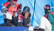 Gold medal winner Zoi Sadowski Synnott of New Zealand, silver medal winner Julia Marino of the United States and bronze medal winner Tess Coady of Australia celebrates after the Snowboard Slopestyle Final for women at Genting Snow Park during the Winter Olympic Games on Feb. 6, 2022, Zhangjiakou, China.