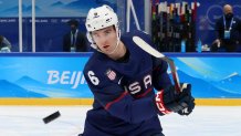 Nick Perbix of Team United States warms up before the men's ice hockey preliminary round against Team China at National Indoor Stadium, Feb. 10, 2022, in Beijing, China.