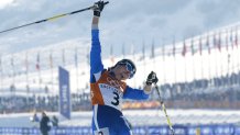 Stefania Belmondo of Italy celebrates winning the gold medal in the women's 15km cross country