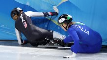 Kristen Santos and Arianna Fontana crash into the boards