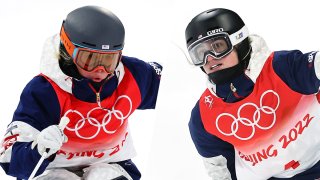 Team USA skiers Hannah Soar, left, and Olivia Giaccio, right, competes on the medal round for freestyle skiing women's moguls on Feb. 6, 2022, in Beijing, China.