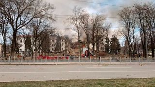 This photo released by Donetsk Regional Civil-Military Administration Council on Wednesday, March 16, 2022 shows the Drama Theatre, damaged after shelling, in Mariupol, Ukraine.