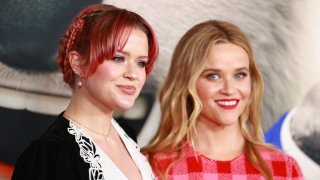 (L-R) Ava Elizabeth Phillippe and Reese Witherspoon attend the premiere of Illumination’s “Sing 2” on December 12, 2021 in Los Angeles, California.