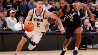 NEW YORK, NEW YORK – MARCH 11: Collin Gillespie #2 of the Villanova Wildcats dribbles the ball as R.J. Cole #2 of the Connecticut Huskies defends in the second half of the game during the 2022 Big East Tournament at Madison Square Garden on March 11, 2022 in New York City.