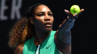 Serena Williams of the US serves against Germany’s Tatjana Maria during their women’s singles match on day two of the Australian Open tennis tournament in Melbourne on January 15, 2019.