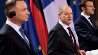 German Chancellor Olaf Scholz, French President Emmanuel Macron and Polish President Andrzej Duda attend a news conference ahead of a Weimar Triangle meeting to discuss the ongoing Ukraine crisis, in Berlin, Germany, February 8, 2022.