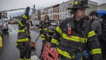 New York City Fire Department firefighters respond to the scene of a rush-hour shooting at a subway station in Brooklyn, New York, on April 12, 2022. 