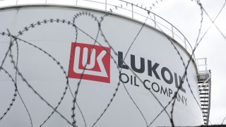 This photograph taken on May 13, 2022 shows a view of Russian oil company Lukoil fuel storage tank in Brussels.