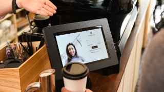 Mastercard’s biometric checkout technology lets users pay by scanning their face or palm.