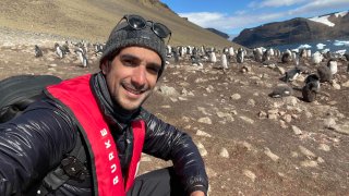 Sebastian Modak, pictured here in Antarctica, spent an entire year on the road.