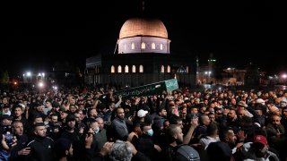 Mourners carry the coffin of Palestinian, Waleed Shareef