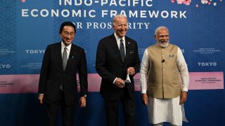 Japan's Prime Minister Fumio Kishida, US President Joe Biden, and India's Prime Minister Narendra Modi