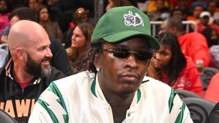 ATLANTA, GEORGIA - MARCH 25: Rapper Young Thug attends the game between Golden State Warriors and the Atlanta Hawks at State Farm Arena on March 25, 2022 in Atlanta, Georgia.