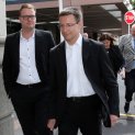 Megaupload executives Mathias Ortmann (2nd L) and Bram van der Kolk (L)