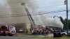 Firefighters Battle Large Fire at Enfield Auto Dealership