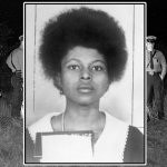 Troopers inspect Coston's body in high grass 50 yards off th