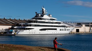 The superyacht Amadea is moored in Honolulu on Thursday, June 16, 2022. The Russian-owned superyacht seized by the United States arrived in Honolulu Harbor flying an American flag after the U.S. last week won a legal battle in Fiji to take the $325 million vessel.