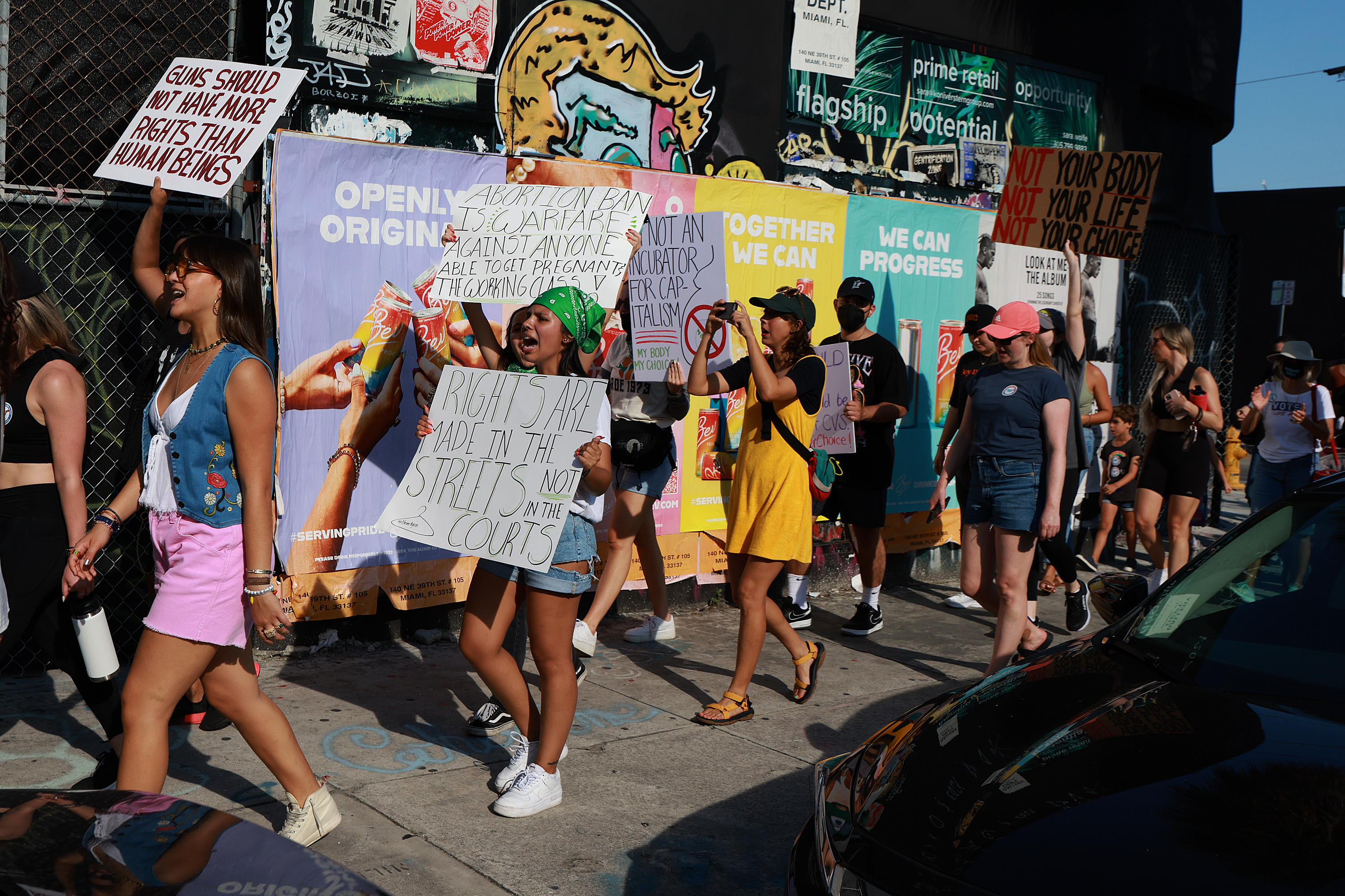 People march together to protest the Supreme Court’s decision in the Dobbs v Jackson Women’s Health case on June 24, 2022 in Miami, Florida.