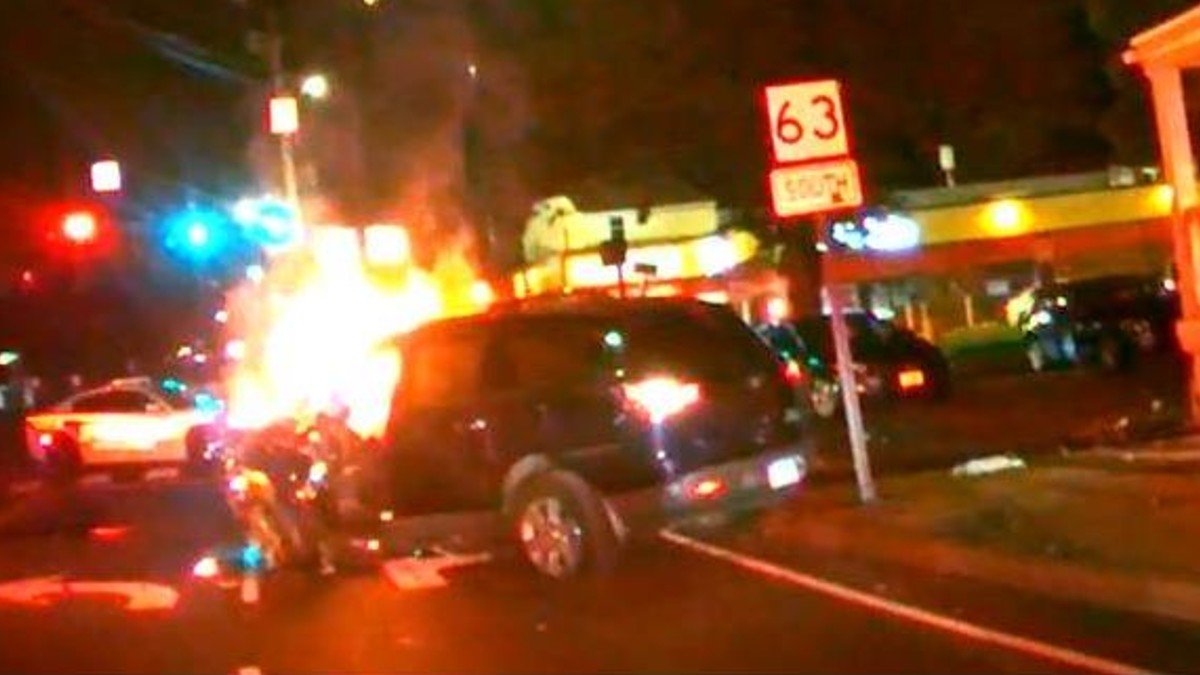 Police Officer Pulls Man From Vehicle After Fiery Crash in New Haven ...