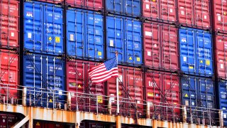 A U.S. flag is seen on the container ship President Eisenhower in a seaport in Qingdao city in east China’s Shandong province Thursday, Dec. 23, 2021.
