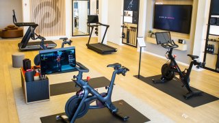 Exercise equipment and apparel for sale at the Peloton showroom in Dedham, Massachusetts, U.S., on Wednesday, Feb. 3, 2021.