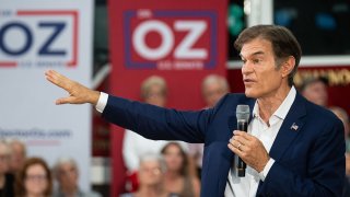 FILE - Republican U.S. Senate candidate Mehmet Oz holds a rally in the Tunkhanock Triton Hose Co fire station in Tunkhanock, Pa., on Aug. 18, 2022.