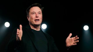 FILE - Tesla CEO Elon Musk speaks before unveiling the Model Y at Tesla's design studio in Hawthorne, Calif., March 14, 2019.