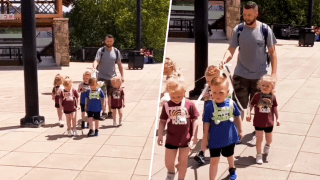 Jordan Driskell walking with his quintuplets