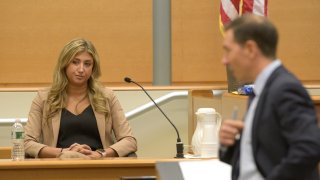 Brittany Paz, a lawyer hired by Alex Jones’ defense to testify on Infowars' workings, is questioned by attorney Chris Mattie during Jones' Sandy Hook Elementary School defamation damages trial at Waterbury Superior Court, Sept. 14, 2022, in Waterbury, Connecticut.