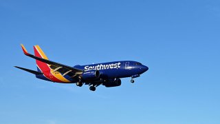 A Southwest Airlines plane approaches the runway at Ronald Reagan Washington National Airport in Arlington, Virginia, on April 2, 2022.