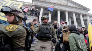Members of the Oath Keepers militia group among supporters of U.S. President Donald Trump, on the steps of the U.S. Capitol, in Washington, January 6, 2021.