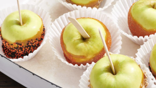 Caramel apples are displayed in New York