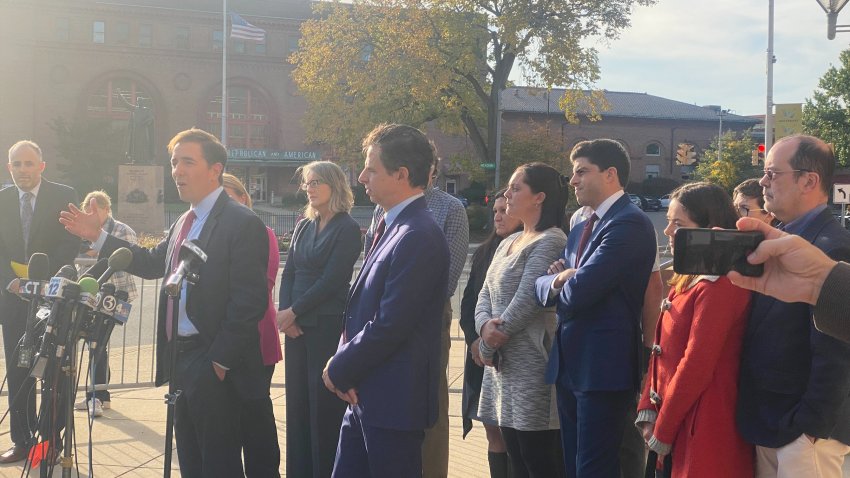 The plaintiffs in the Alex Jones trial hold a press conference after the verdict is read.