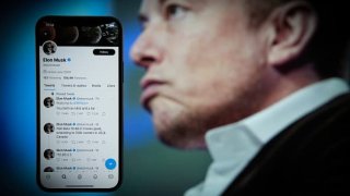 The Twitter profile page belonging to Elon Musk is seen on an Apple iPhone mobile phone.