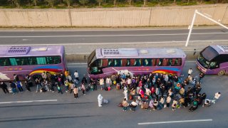 After a Covid outbreak at a Foxconn factory in Zhengzhou, China, some workers chose to go home. Pictured here are the shuttle buses on Oct. 30, 2022.