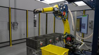 An Amazon Sparrow package handling robot during the Delivering the Future event at the Amazon Robotics Innovation Hub in Westborough, Massachusetts, US, on Thursday, Nov. 10, 2022.